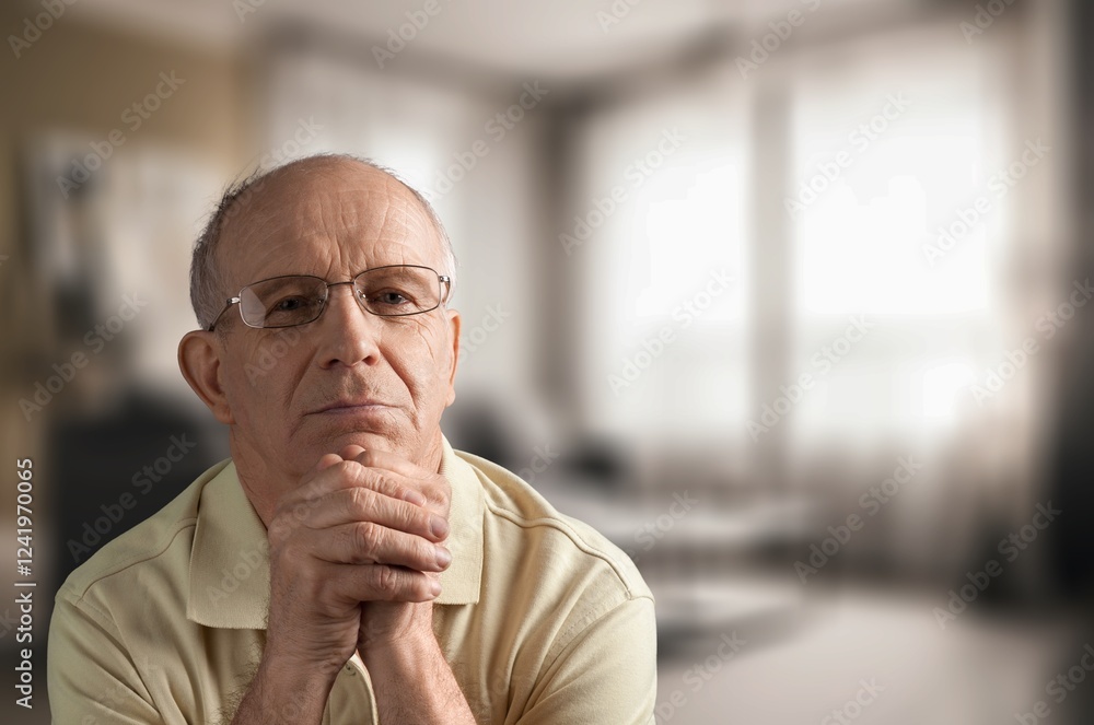 Thinking old senior man posing in home Thinking old senior man posing in home