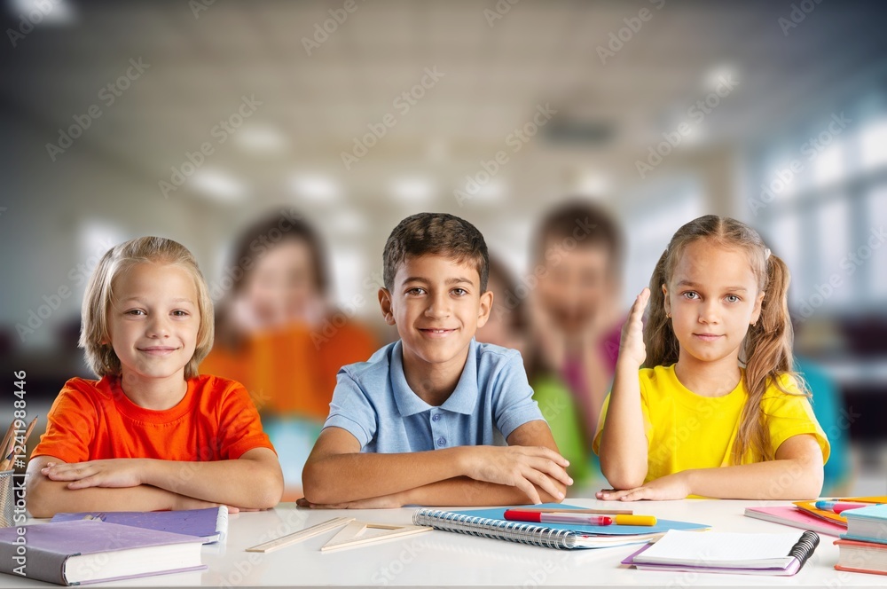 Happy smart small student hands in classroom Happy smart small student hands in classroom