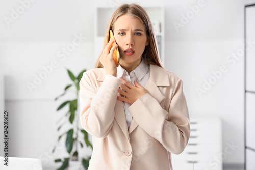 Worried young woman talking...