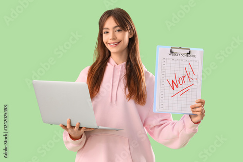 Teenage girl with laptop an...