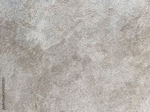 Old wet white building wall that needs repair. Grunge concrete surface texture. Horizontal orientation