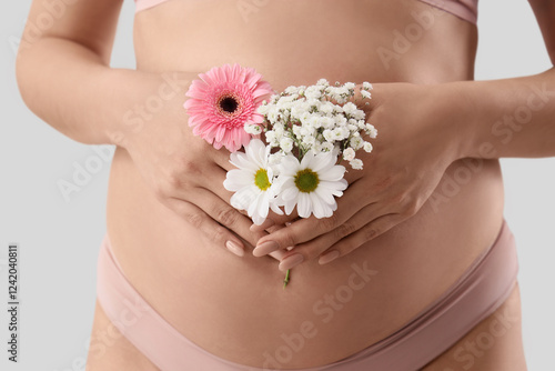 Young pregnant woman in pan...