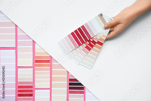 Hand holding color palette ...