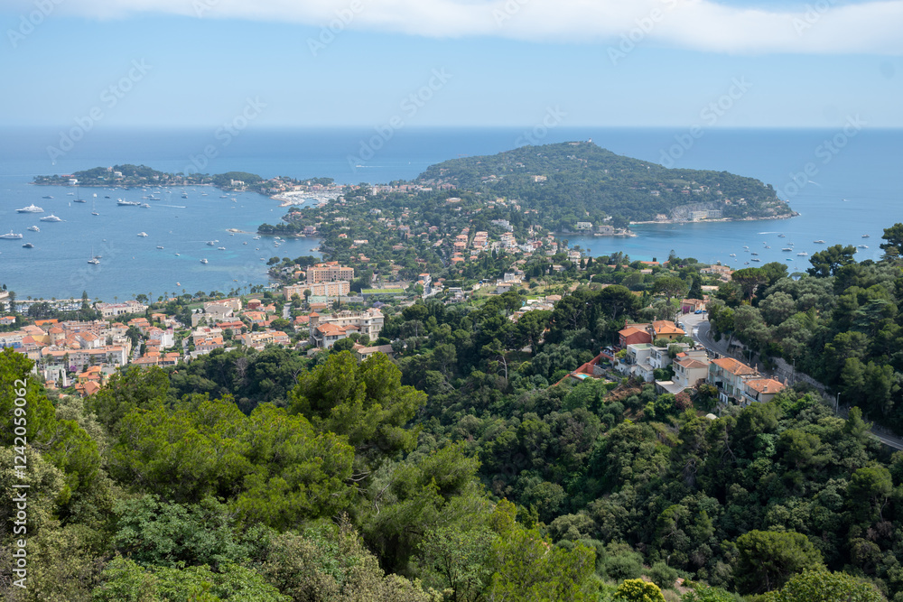 Panoramic view of Saint-Jean-Cap-Ferrat commune in Alpes-Maritimes in Provence-Alpes-Cote d'Azur, French Riviera, France Panoramic view of Saint-Jean-Cap-Ferrat commune in Alpes-Maritimes in Provence-Alpes-Cote d'Azur, French Riviera, France