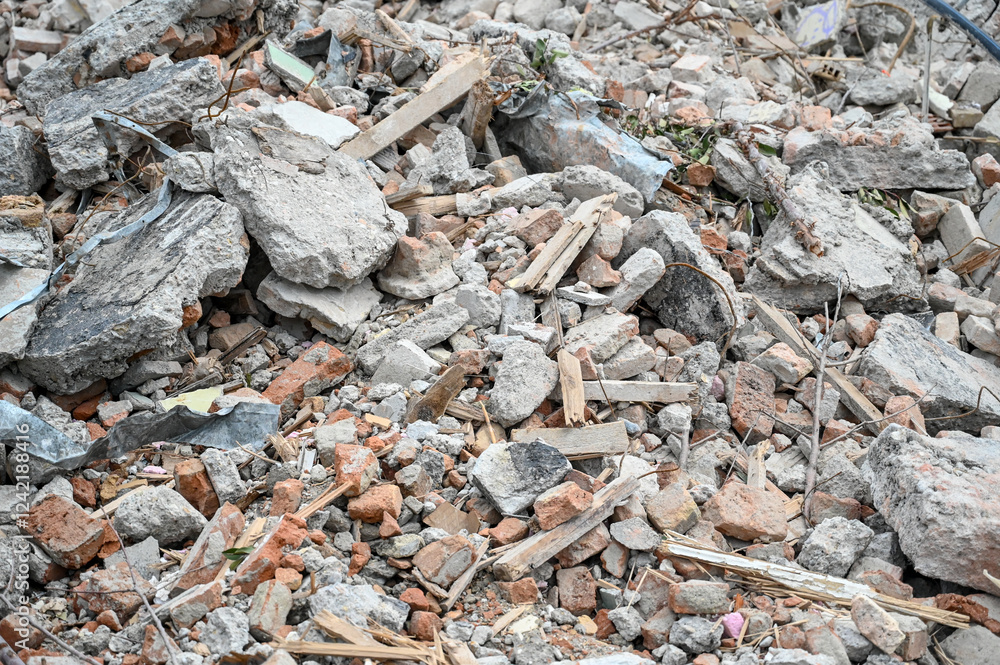 Pile of rubble on construction site. A pile of bricks, concrete and rebar. Ruins of an old building. Debris. Pile of rubble on construction site. A pile of bricks, concrete and rebar. Ruins of an old building. Debris.