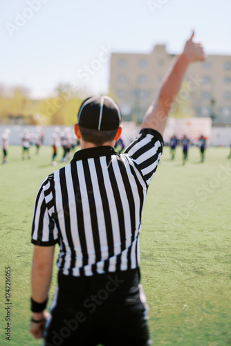  the referee during the game  photo