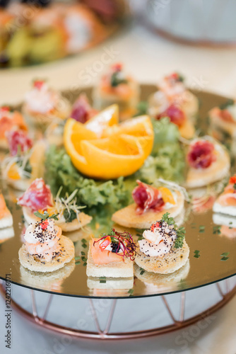 Elegant Canapés and Appetizers on Decorative Tray photo