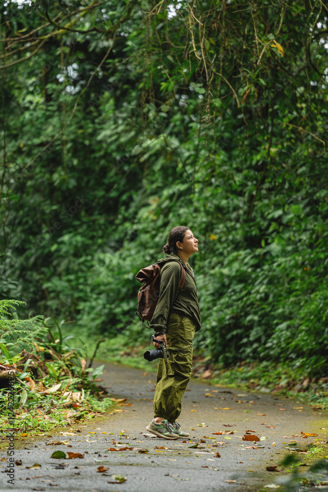 Explorer in a tropical forest enjoying nature. Explorer in a tropical forest enjoying nature.