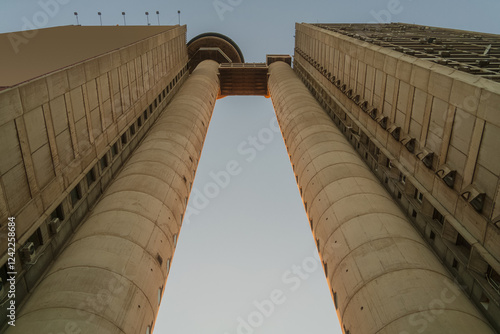 Obraz na płótnie Brutalism socialist architecture buildings of Genex Tower or Western City Gate in New Belgrade Block district at sunset w salonie