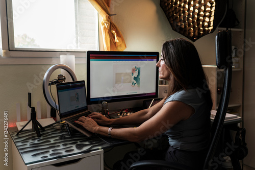 Mature woman working in creative workspace photo