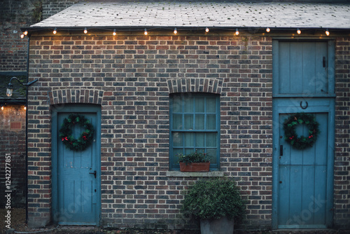 Old Building with Christmas Lights and Wreaths photo