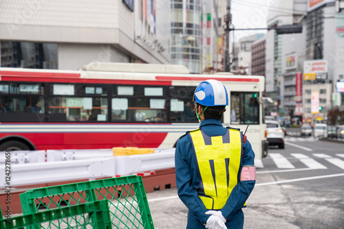 Anonymous traffic controller on the street photo