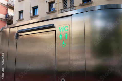 Free public toilet wc restroom with green light and sign and symbols