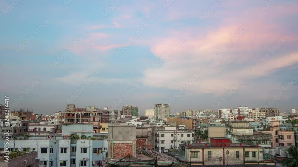 A mesmerizing timelapse of sunset in Dhaka, as the sun paints the clouds with warm hues, creating a stunning cityscape view. A mesmerizing timelapse of sunset in Dhaka, as the sun paints the clouds with warm hues, creating a stunning cityscape view.