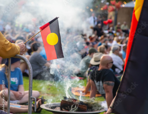 Australian aboriginal flag at the indigenous Smoking Ceremony, meeting and rite at public event