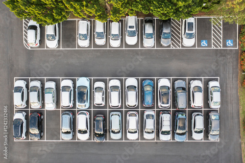 Aerial View of Well Organized Parking Lot with Cars photo