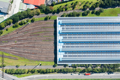 Railway depot yard with adjacent solar panels photo