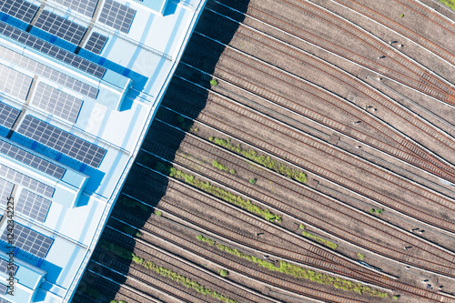 Aerial View of Metro Depot with Solar Panels and Railway Tracks photo