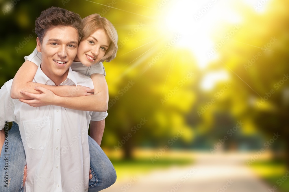 Fototapeta premium Young adult happy couple hug