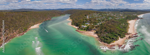 River flowing out to see past rocky point photo