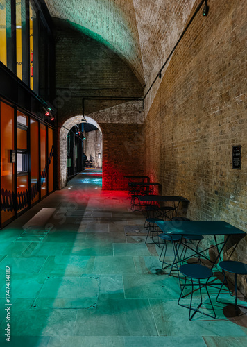 Moody london alleyway glowing with vivid light reflections photo