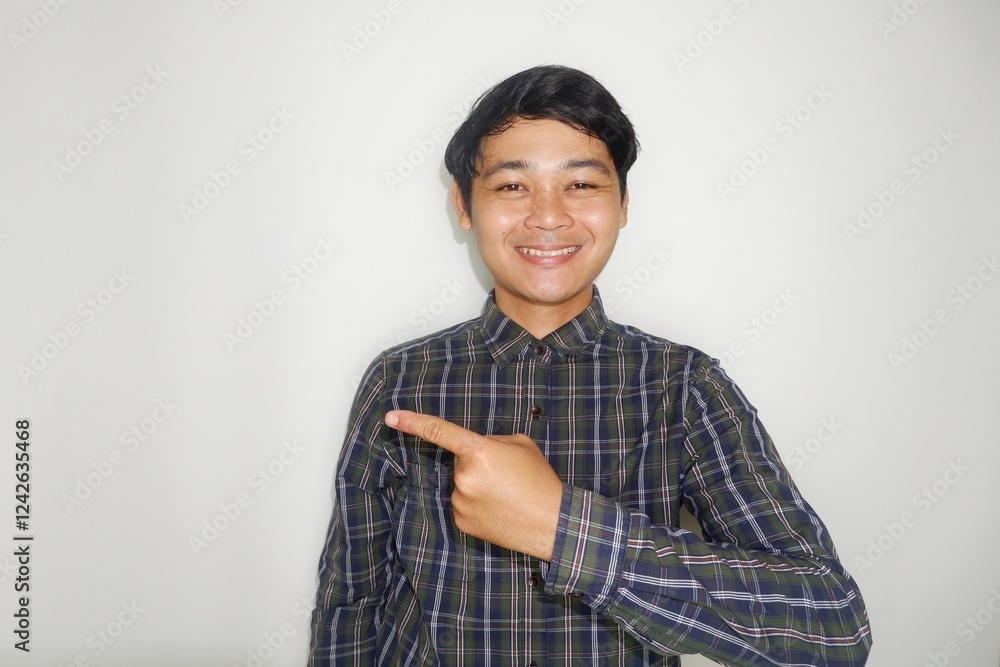 Indonesian men like to wear green shirts with confused, sullen, angry and happy expressions with various random hand movements on a plain white background Indonesian men like to wear green shirts with confused, sullen, angry and happy expressions with various random hand movements on a plain white background
