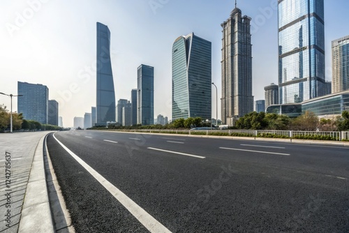 Wide asphalt road stretching through a modern cityscape with sleek skyscrapers and glass towers in the background, modern city, urban sprawl, urban development, cityscape, highway