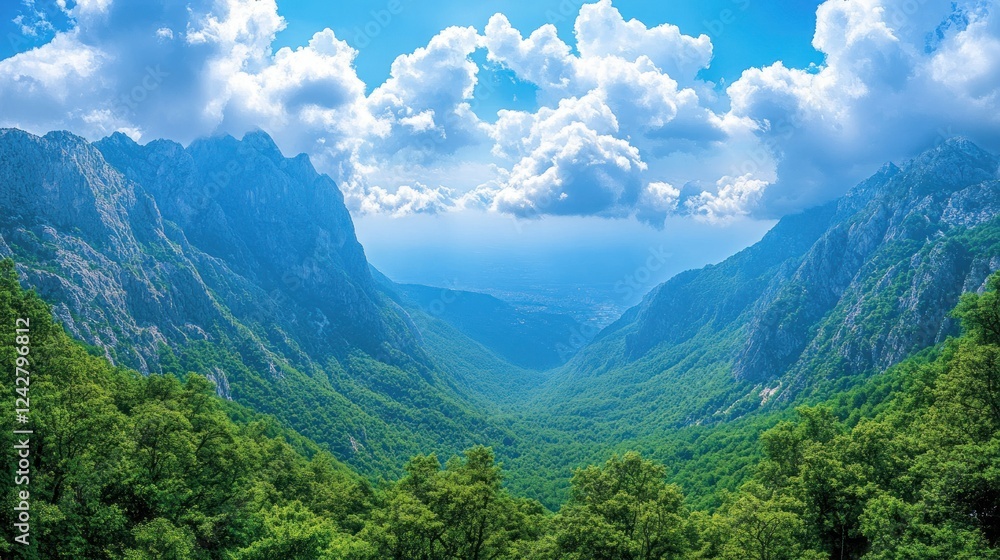 Obraz premium Mountain Valley Scenery Under a Sunny Sky