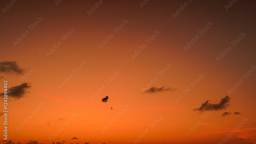Naklejka premium Red purple orange blue pink sunset sky cloud Red purple cloudscape background Dark red purple sunset sky cloud background day night Dramatic sunset sky Patong Phuket Thailand.