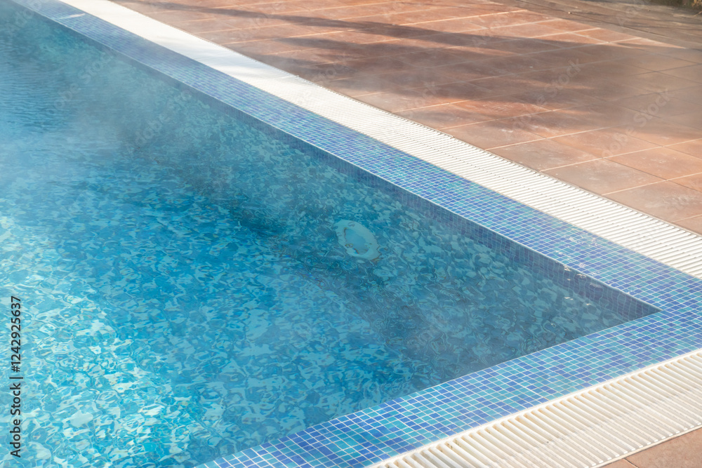 Obraz premium Detail of modern outdoor swimming pool in luxury hotel
