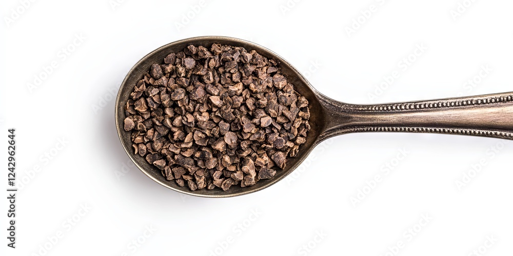 Close Up of Chocolate Nibs in a Spoon Close Up of Chocolate Nibs in a Spoon