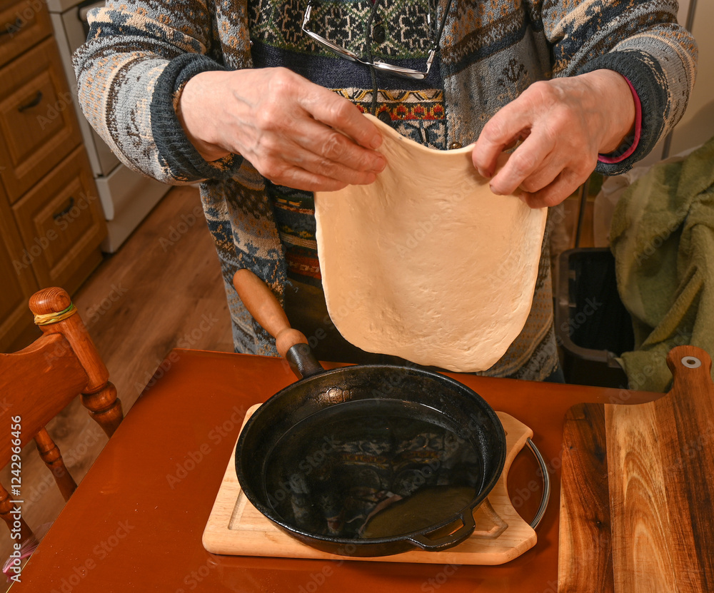 Preparing dough in a cozy kitchen for a delicious homemade meal during evening hours