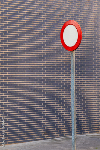 Urban street with restrictive traffic sign in Barcelona, España. photo