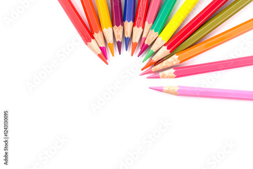 Multi-colored pencils on a white background. Drawing, notes, writing. photo