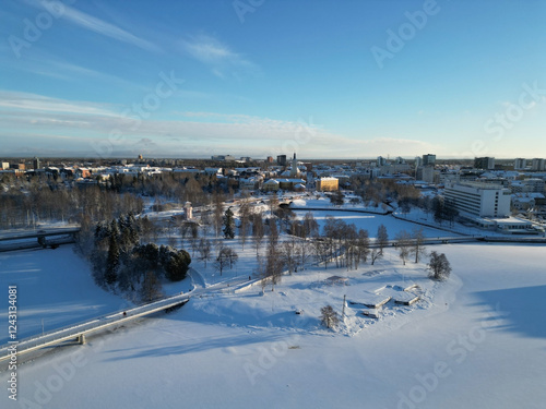 Aerial view of snowy cityscape in January, Oulu Finland photo