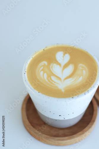 Latte Art Coffee Cup Sits Perfectly on Wooden Coaster Gently