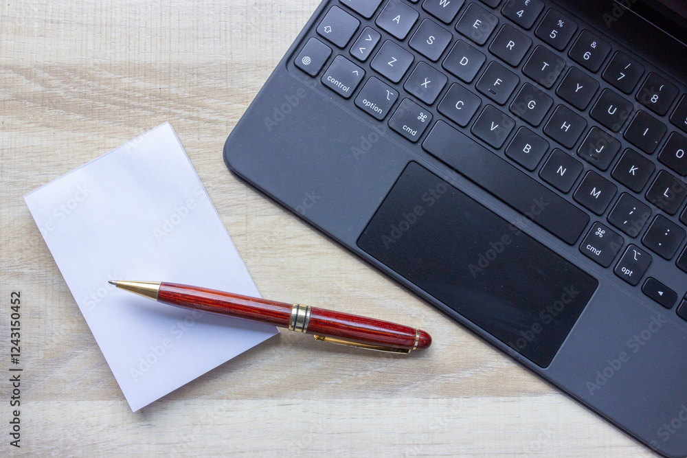 notebook and pen on the desk notebook and pen on the desk