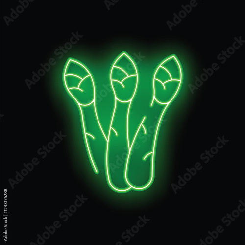 Green neon sign illuminating three asparagus on a black background
