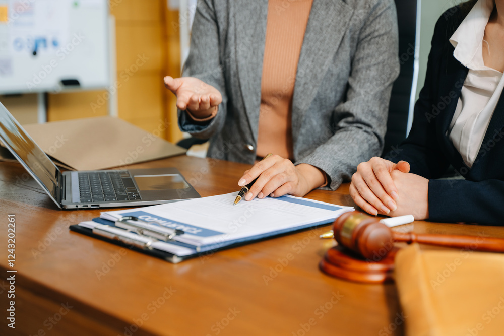 Business people compassionately holding hands and discussing contract papers Business people compassionately holding hands and discussing contract papers