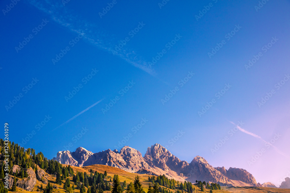Mountain landscape with clear blue sky on a sunny day. Mountains of the Dolomites. Thought Tyrol, Italy Europe. Horizontal banner