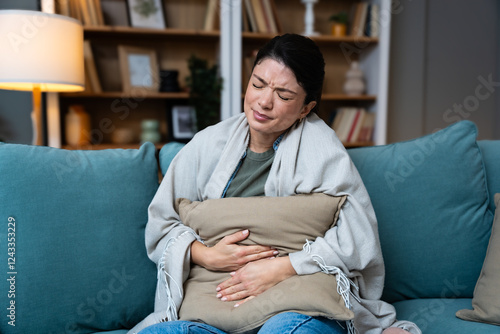 Bilde på lerret Stomach ache, cramps and hands of woman with abdomen pain due to constipation, menstruation or ibs issue