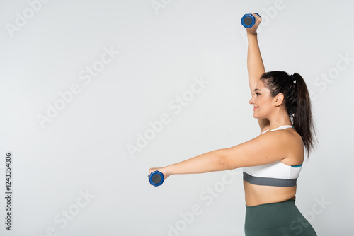 Photography Empowering fitness journey of a strong woman lifting weights indoors