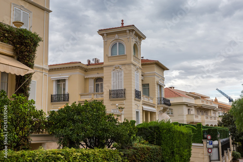 Fragment of urban district in Monaco Old town in overcast photo