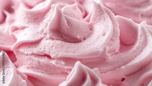 Close-up of Delicate Pink Frosting Swirls: A Creamy Delight photo