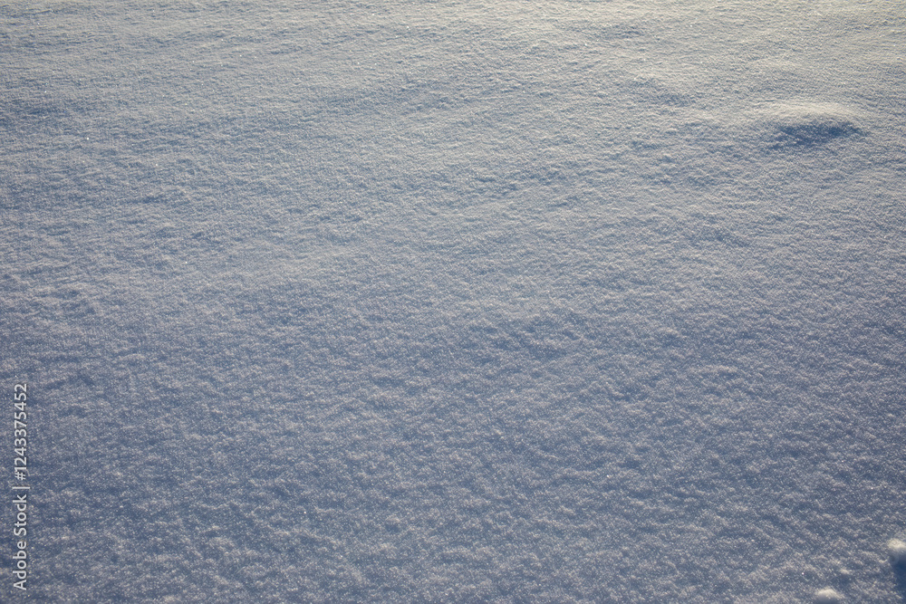 Surface of pure white snow with bumps.Winter image.