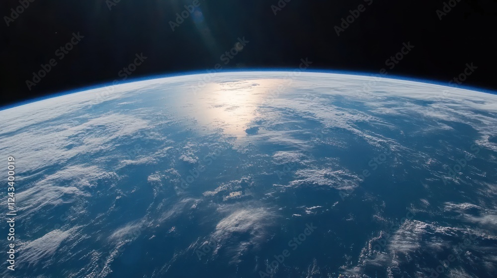 Fototapeta premium A stunning view of Earth from space, showcasing the atmosphere and oceanic surface.