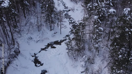 Caucasus, North Ossetia. Tsei Gorge. River under snow. photo