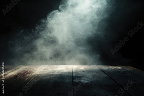 Dark moody atmospheric background with rising smoke and dramatic lighting over wooden table surface photo