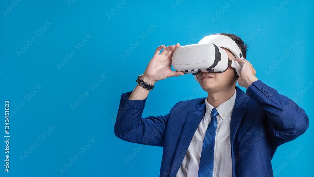 Businessman in VR headset controls virtual reality AI program to give instructions Businessman in VR headset controls virtual reality AI program to give instructions