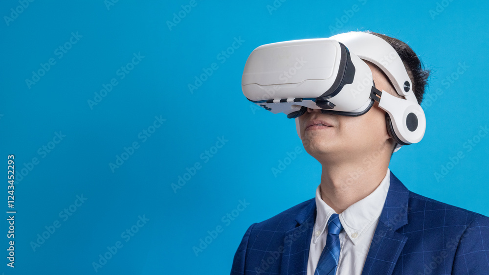 Businessman in VR headset controls virtual reality AI program to give instructions Businessman in VR headset controls virtual reality AI program to give instructions
